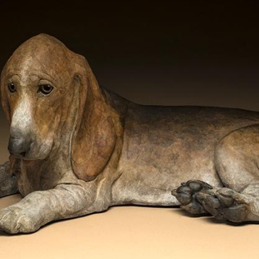Bronze sculpture of a soulful beagle by Star Liana York as seen at Sorrel Sky Gallery